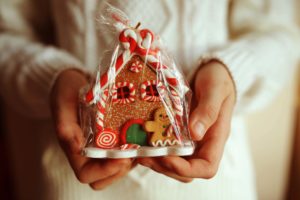 gingerbread house in hands